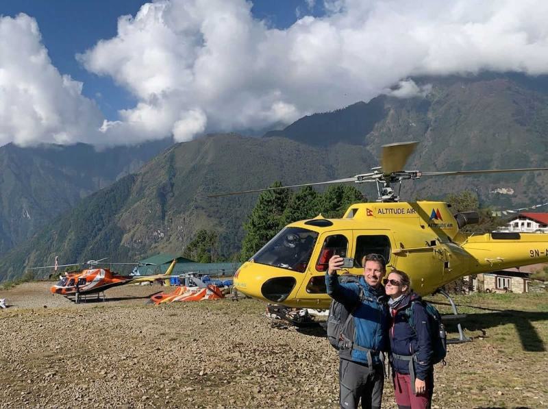 Guest taking video and picture Everest Base Camp Helicopter Tour
